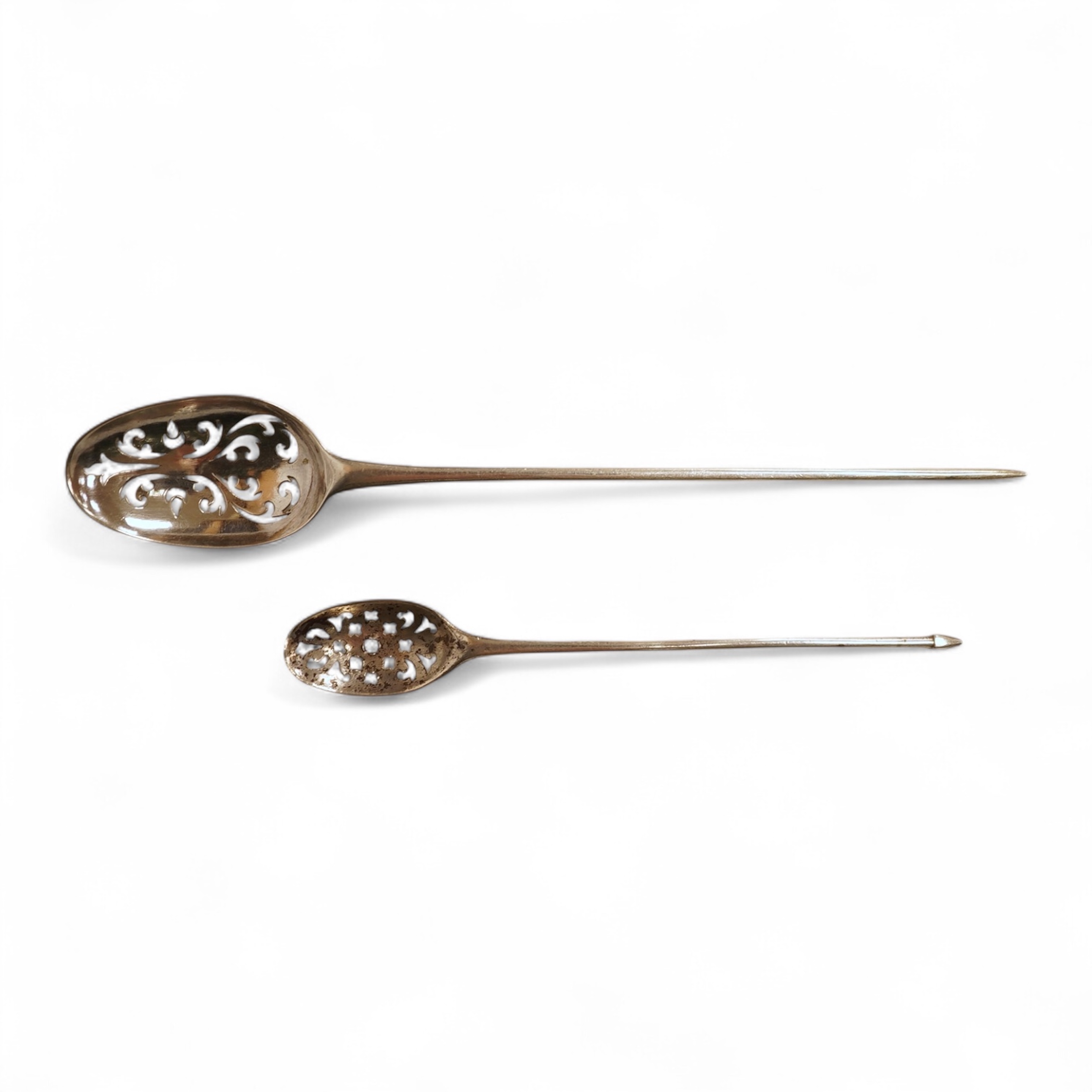Two 18th century silver mote spoons, the largest with makers marl ?L below a crown, 13.1cm.